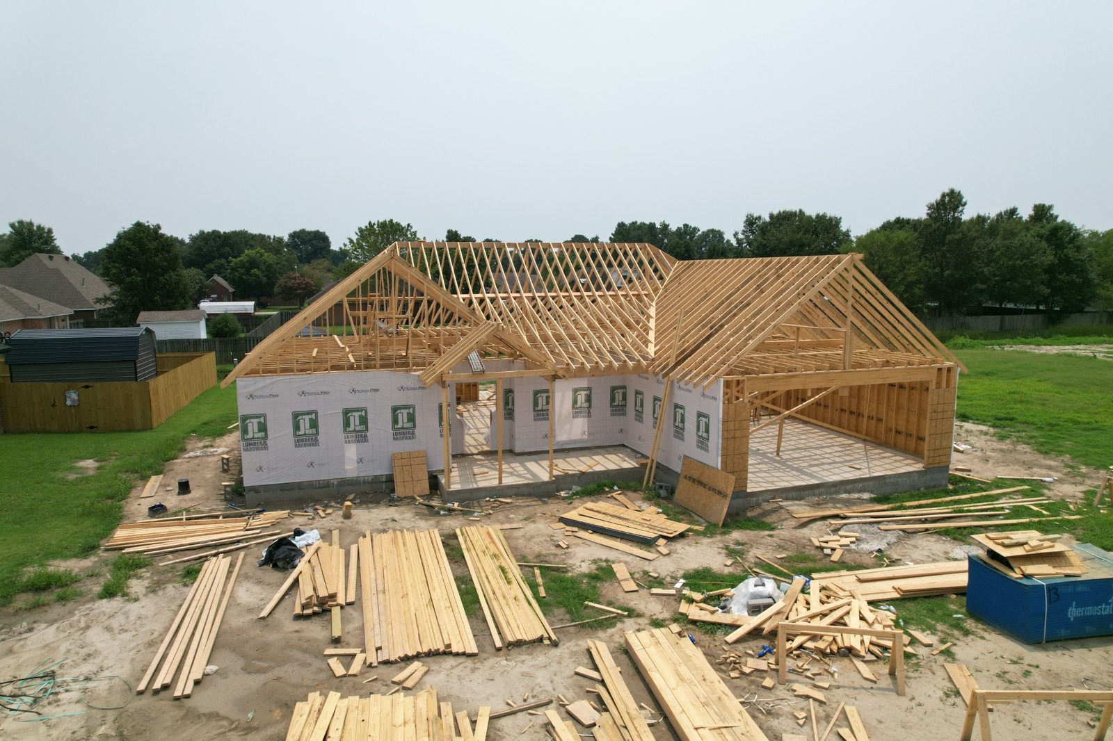 Aerial view of home framing and attached garage